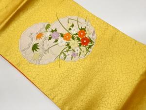 雪輪に花々・笹模様刺繍名古屋帯